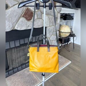 Yellow and blue crossbody bag

11x10x3.25”